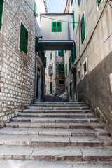 Steps lead up the narrow street