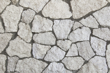 hewn rogh stone white cracked wall texture