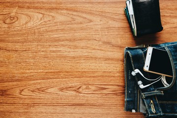 Men's accessories on wooden table.