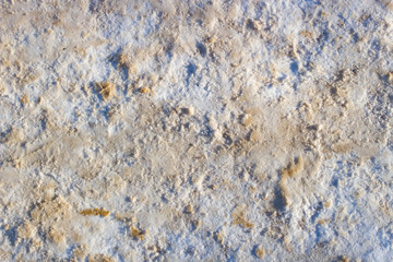Snow and slush footprints on the road