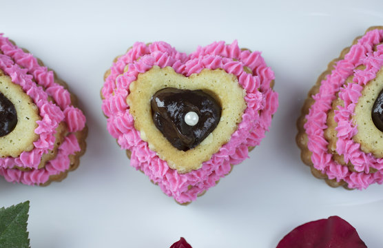 Pink Heart Cupcake With Ganache Filling, and Red Roses