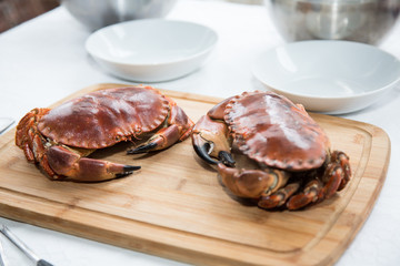 Preparing cooked crab
