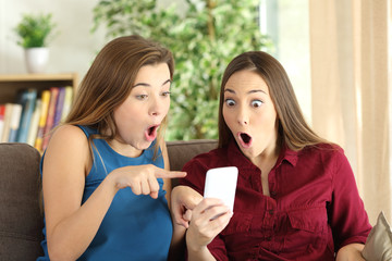 Amazed roommates online with phone