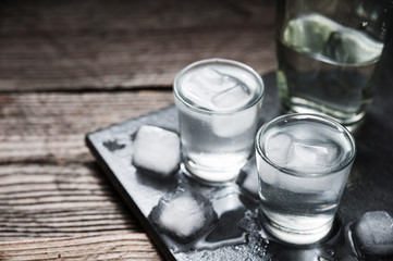 Vodka with ice in shot glasses