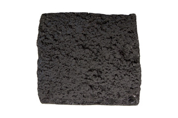 charcoal for hookah in the form of a cube, isolated on white background, close-up