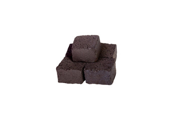 Group of charcoal cubes isolated on white background, coal for hookah