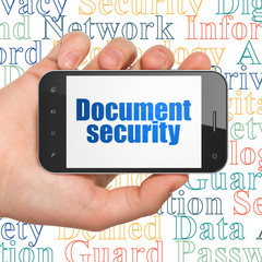 Security concept: Hand Holding Smartphone with Document Security on display