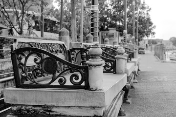 Bench park / View of old bench park on pathway. Black and white tone.