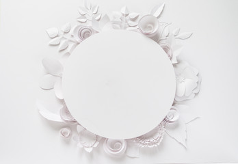 round frame with white paper flowers