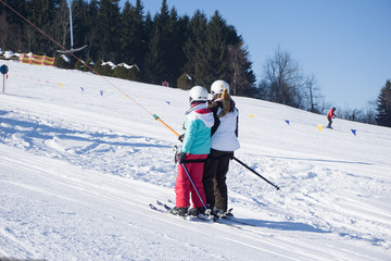 Fototapeta na wymiar people on a ski lift