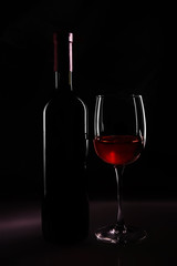 Bottle and wineglass