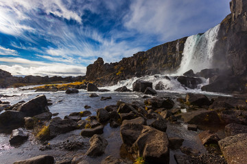 Fototapeta na wymiar Thingvellir waterfall. Autumn landscape. Wild nature in Iceland