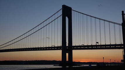 Suspension Bridge At Dawn Or Dusk