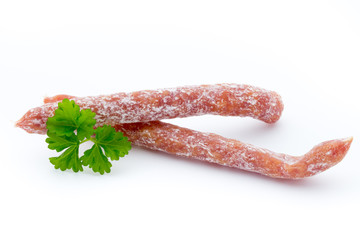 Smoked sausage salami isolated on a white background.