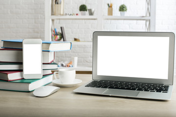 Workplace with white notebook