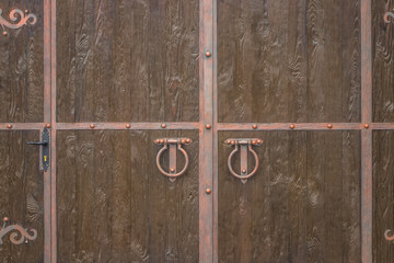 The Old door knocker. wood