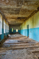 Ruined Long Corridor Of Abandoned School After Chernobyl Nuclear