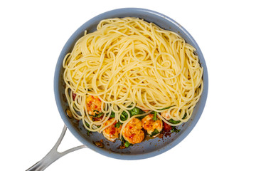 Spaghetti, prawns, fried in a skillet. Insulated