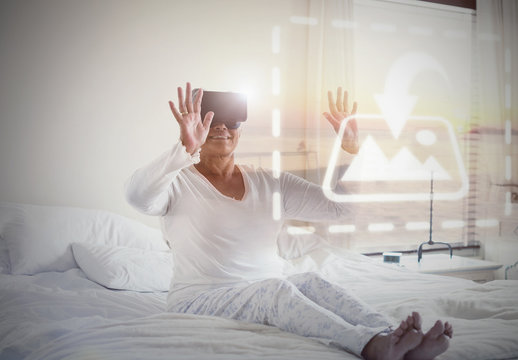 Senior VR User on Bed Mockup 2