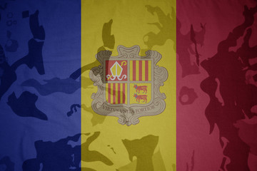 flag of andorra on the khaki texture . military concept