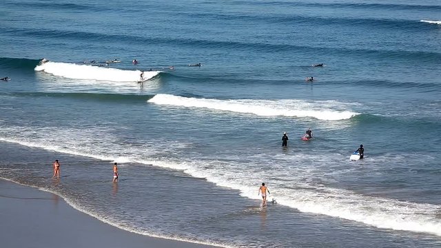 Surfers at Biarritz beach