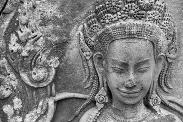 ancient engraving on a stone wall
