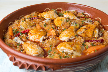 sour cabbage and chicken meal in a bowl