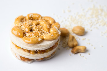 Cashew caramelised sweet snack with seeds