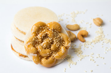 Cashew caramelised sweet snack with seeds