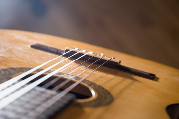Fototapeta premium Guitar music instrument macro drammatic picture useful for background