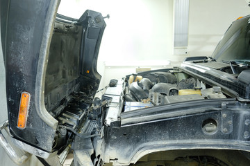 Close up car in a car repair station