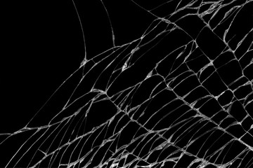 Abstract of cracks of the glass on a black background.