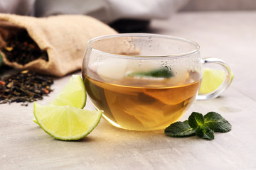 Tea. Herbal tea. Mint leaf. Tea in a glass cup, mint leaves, dri