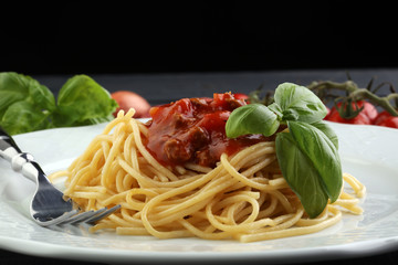 Plate of delicious spaghetti Bolognaise or Bolognese with savory