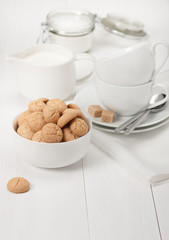 Amaretti Biscuits. Kitchenware. White Wooden Table