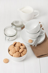 Amaretti Biscuits. Kitchenware. White Wooden Table