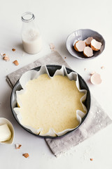 Fototapeta na wymiar Baking cake ingredients: milk, eggs, butter.