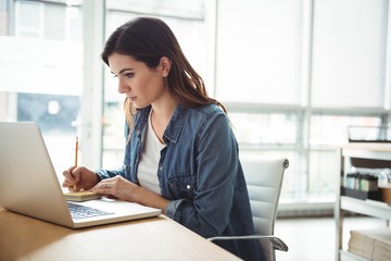 Businesswoman working in office