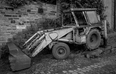 Fototapeta na wymiar Forgotten Old tractor