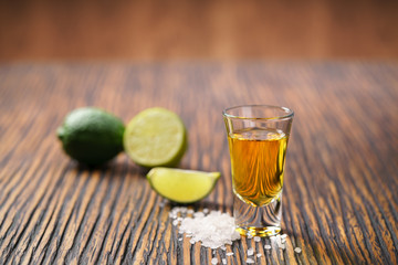 Gold mexican tequila shot ,selective focus