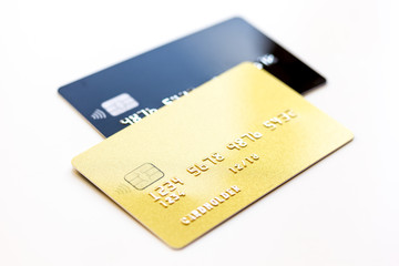 pile of credit cards on white background