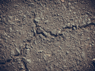 Grey clay, concrete wall with cracks