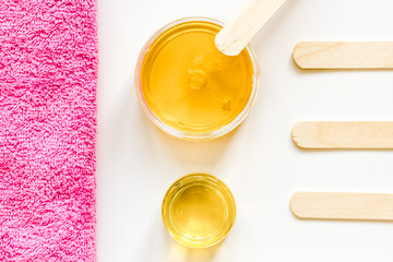 concept depilation with wax on white background top view