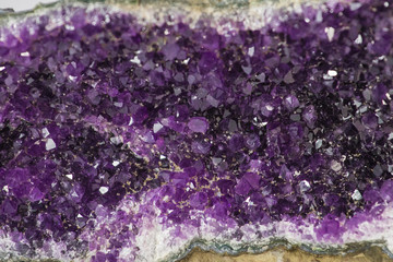 Purple amethyst geode cathedral isolated over white background