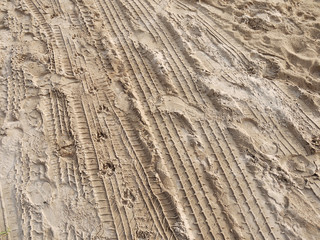 Texture of wheel track on the sand