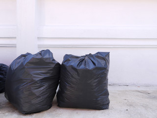 Black garbage bags on the street