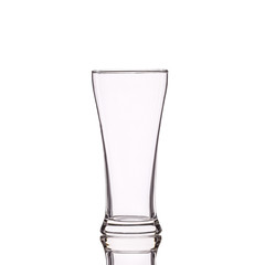 Empty clear drinking glass. Studio shot isolated on white