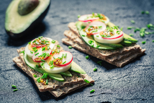 Spring sandwich with avocado, radish and eggs