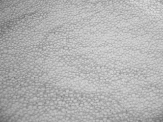 background from the white marbles of foam plastic