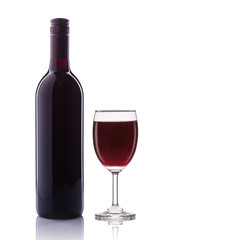 Bottle of red wine and glass. Studio shot isolated on white